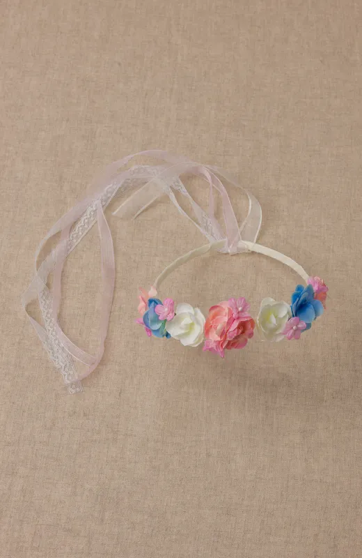 Corona niña Ceremonia flores multicolor en rosas, azules y crudos, ideal para Comunión y Arras