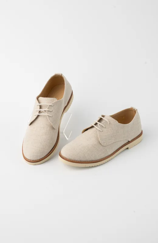 El detalle que marca Zapatos niño vestir tejido lino tostado