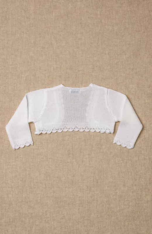 Para no renunciar al estilo Bolero bebé color crudo perfecta para ceremonias infantiles