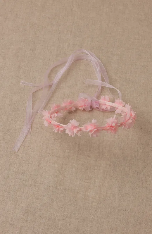Corona niña suaves florecitas rosas ceremonia