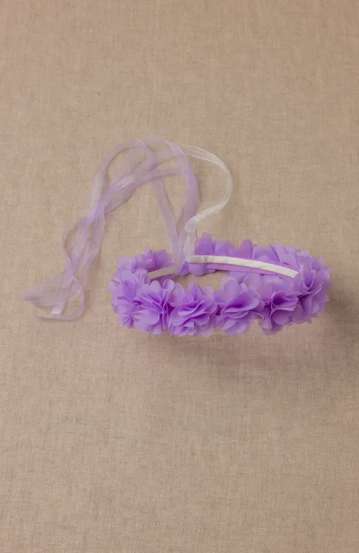 Corona niña ceremonia pétalos morados