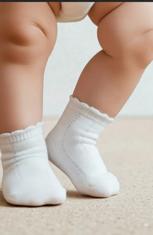 Calcetín bebé color crudo Condor