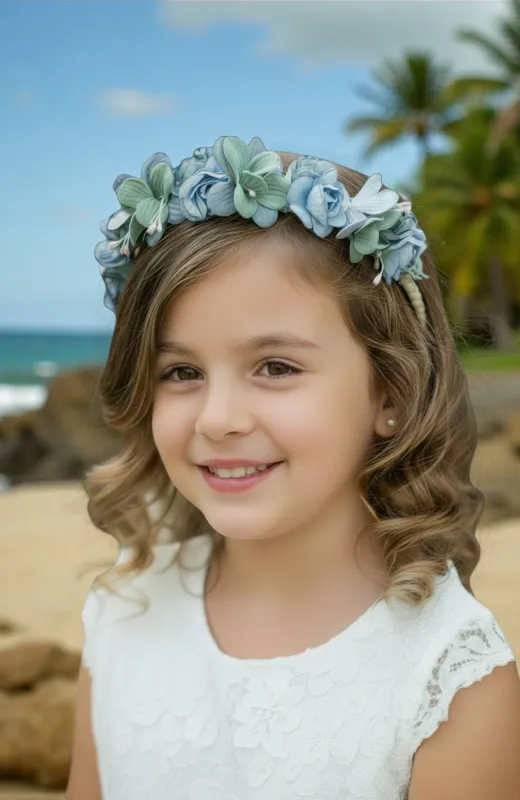 Corona ceremonia niña flores azules Medina