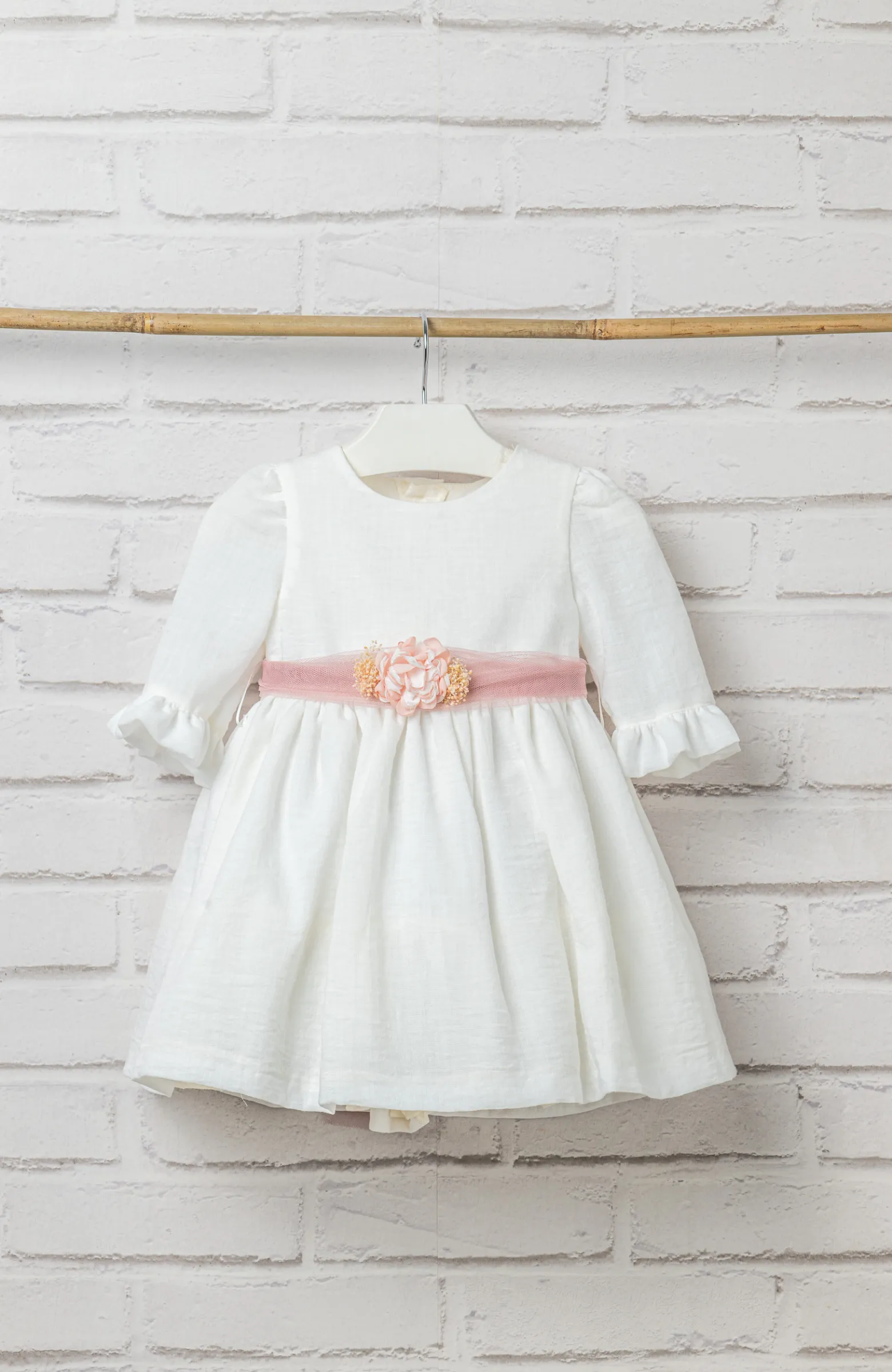 Vestido ceremonia niña bebé manga francesa con fajín rosa ideal para Bautizo