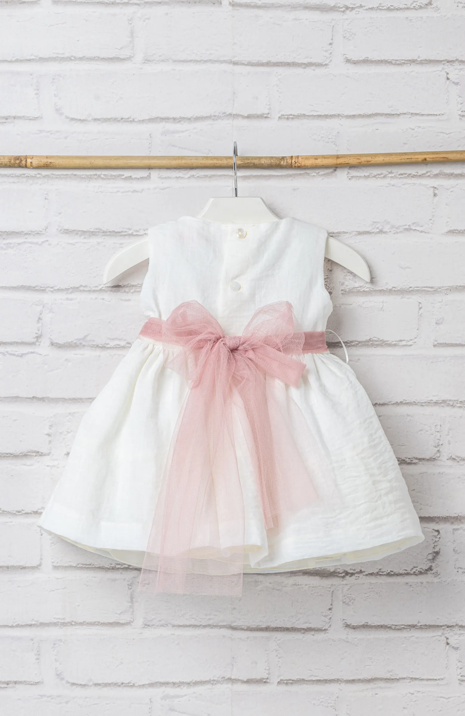 Vestido Ceremonia bebé bambula fajín rosa espalada escotada