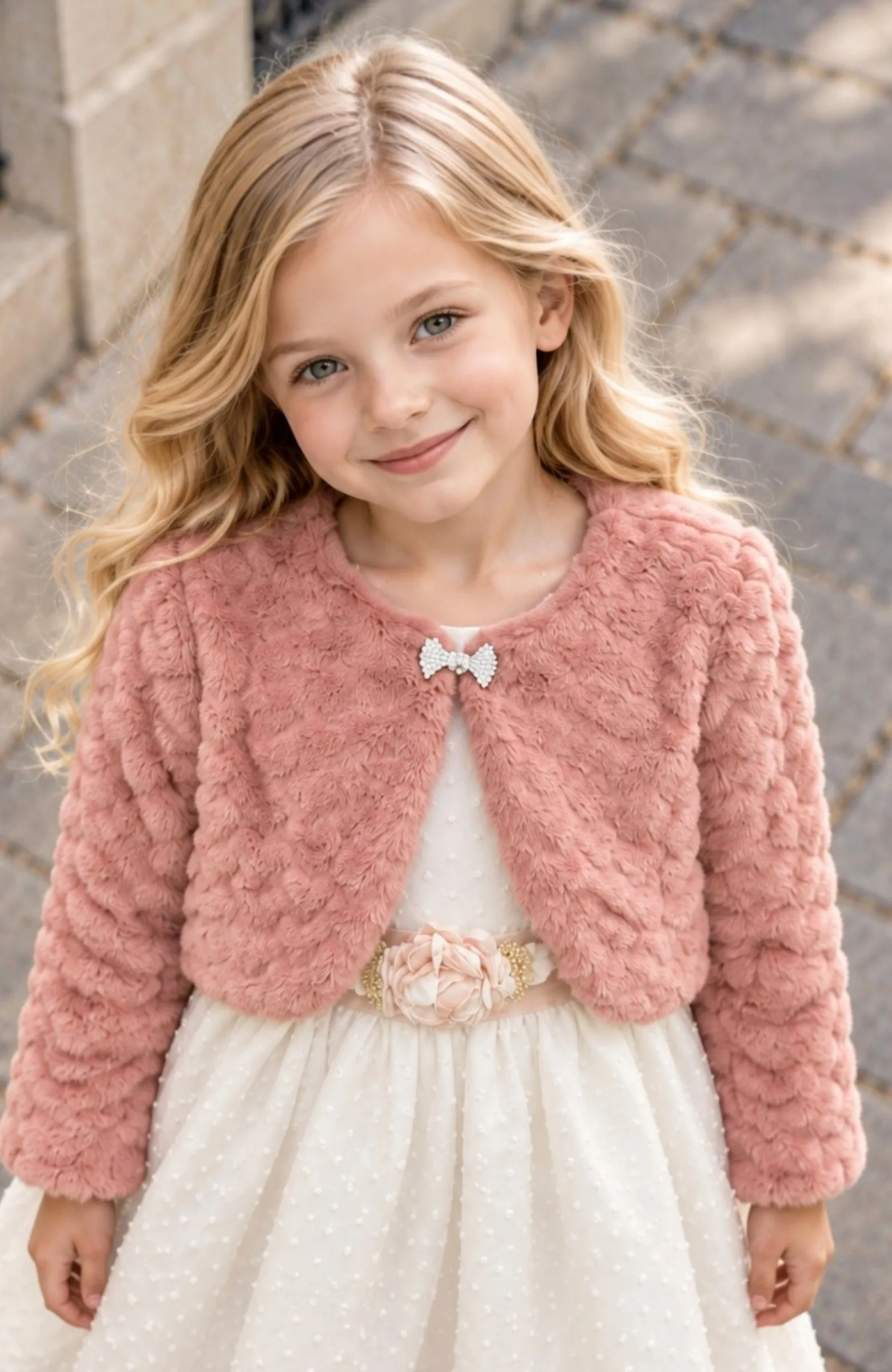 Bolero niña pelo Vuvalu rosado